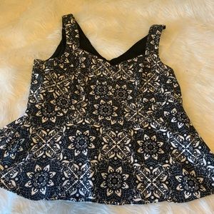 Lace patterned peplum top